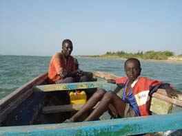 pirogue owner and son
